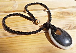 3-row black glass necklace with a large marble pendant