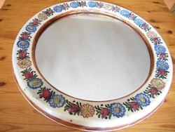 Large painted round wall mirror with painted ceramic frame