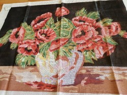 Tapestry needlework.