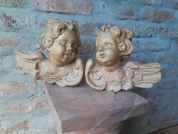 Angel wooden statue in a pair