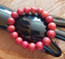 Beautiful sponge coral bracelet strung on a flexible rubber band