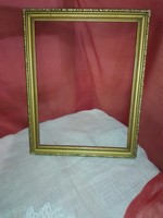 Old gilded wooden picture frame.