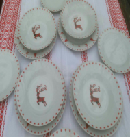 Porcelain plates with Christmas decoration for four people