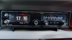 A nice retro flip-up radio clock works, see: video