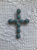Dreamy large silver cross with turquoise stones.