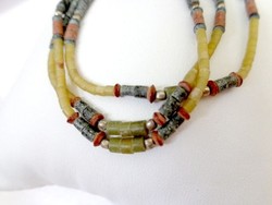 Bracelet made of jade, coral micro beads