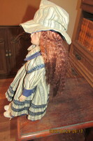 Porcelain doll with a 40 cm stand