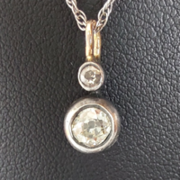 From 137T.1 HUF antique button brilliant 0.5ct pendant, on a silver chain, snow-white flawless stones
