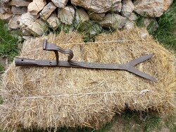 Old wrought iron hay cutter, decorated
