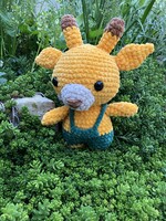 Unique crocheted plush (amigurumi) giraffe with bridle