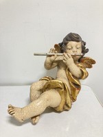 Large painted wooden putto angel with flute figure that can be hung on the wall