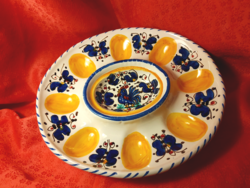 Eggs in ceramic bowl, centerpiece