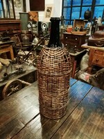 Wicker old glass, perhaps with petroleum in front of it, a wine demizon, large size, for sale as a floor vase