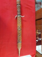 Hand-carved wooden, metal-bladed dagger, sword, decorative sword.