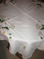 Beautiful hand-crocheted daisy embroidered tablecloth