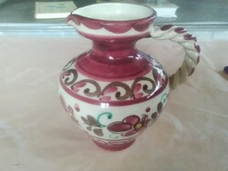Glazed ceramic jug.