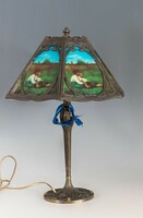 Tiffany style table lamp - with a bucolic scene on the lampshade