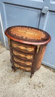 Oval marquetry chest of drawers