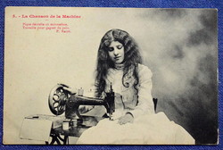 Antique photo postcard little girl sews with a sewing machine