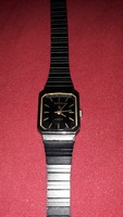 Old citizen Japanese quartz women's watch with untested steel strap as shown in the pictures