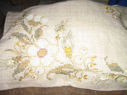 A beautiful hand-embroidered ready-to-sewn decorative pillow