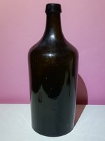 Old dark green wine glass bottle