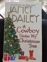 Janet Dailey's A Cowboy Under My Christmas Tree - romantic novel in English