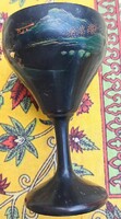 A stemmed glass made with an oriental lacquer technique