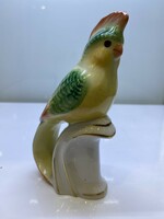 Old drase parrot porcelain figure