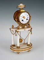 French marble table clock with fire-gilded elements