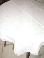 Beautiful pink tulip madeira tablecloth with a lace edge