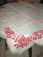 Beautiful pink floral tablecloth embroidered with tiny red cross stitch