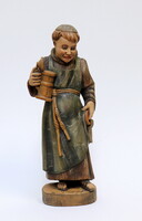 Beer-drinking monk, carved wooden statue