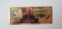 Plastic gilded banknote