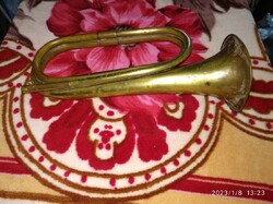 Old military horn, trumpet with crumpled funnel, inflator, without nozzle