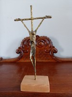 Bronze crucifix marked by Erwin Huber on a wooden base, 1983.