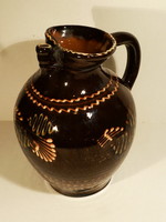 Old, large, glazed ceramic jug
