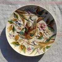 Znaim (xixth century) wall-mounted plastic majolica decorative plate in the style of a bird, diameter 28.5 cm