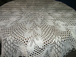 Beautiful crocheted antique white round lace tablecloth