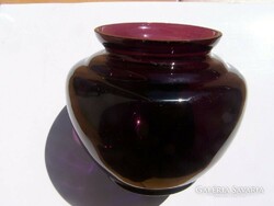 Blown amethyst glass vase. M .: 8 Cm. Small notches on the rim of the mouth