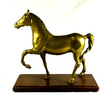 Copper horse statue with wooden base