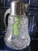 Lead crystal decanter with ice holder.
