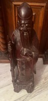 Eastern wise wooden statue
