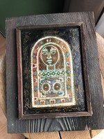 Old fire enamel picture on a wooden board