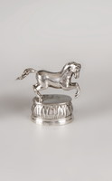 Silver trotting horse figure