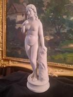 Venus holding an apple: biscuit porcelain sculpture