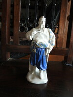 Oriental figure - porcelain sculpture