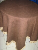 Beautiful huge brown hand-crocheted elegant woven tablecloth with a lace edge