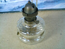 Old kerosene lamp without cylinder and spotlight.