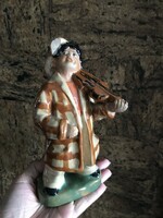Old Szécs ceramic figure of a gypsy playing the violin is defective